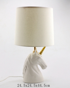 biała ceramiczna lampa stołowa jednorożca
