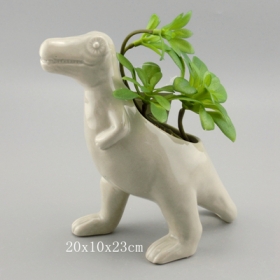 Ceramiczny soczysty garnek t-rex ze sztucznymi roślinami