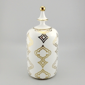 duży ceramiczny słoik z pokrywką złotą i białą dekoracją domową