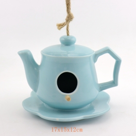 niebieski ceramiczny czajniczek birdhouse wzory karmnika