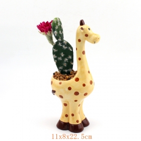 uroczy ceramiczne doniczka żyrafa wypełniona kwiatami